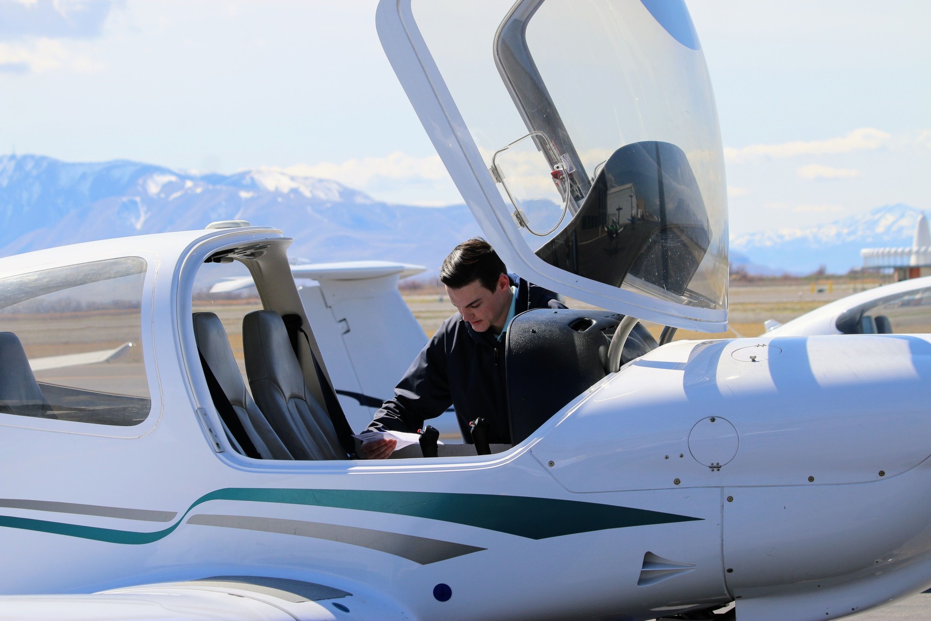 Young Student Pilot Performs Pre-Check Flight School Aviation Pilot Certification and Licensure