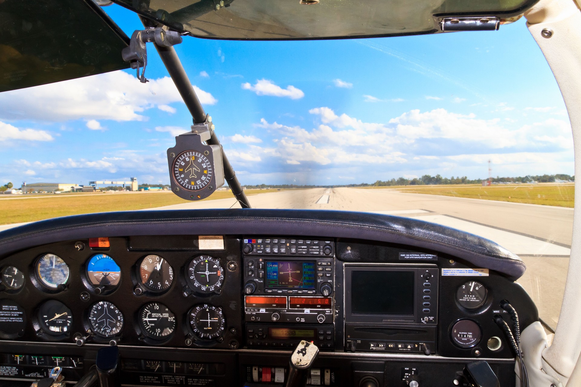 Cockpit view - Small aircraft taking off from runway